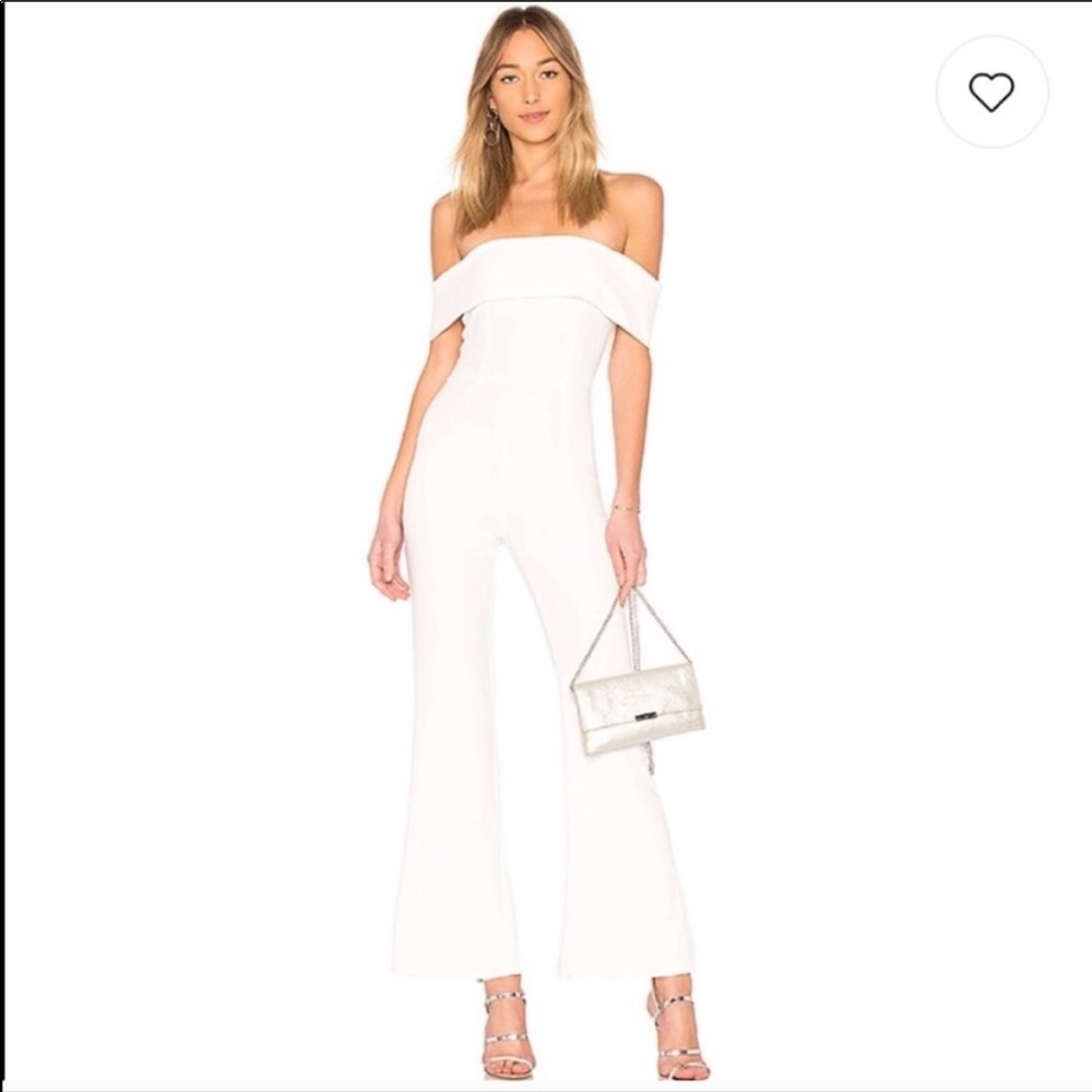 by the way. White jumpsuit - perfect condition